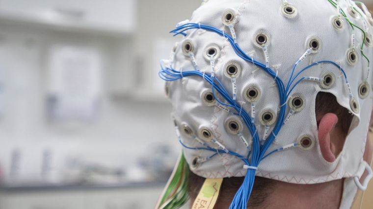Man getting electroencephalogram (EEG)